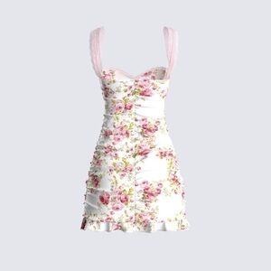 Pretty floral dress by Finese. NWOT- never worn or washed. Size XS